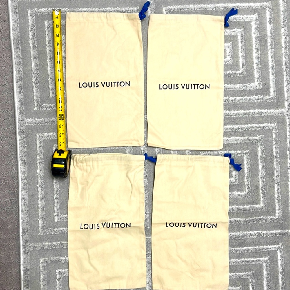 Louis Vuitton shoe bags.